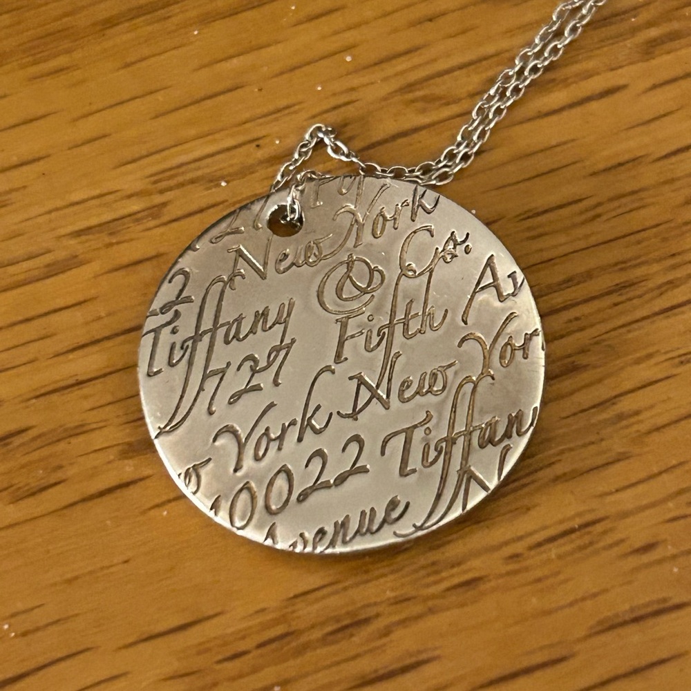 Tiffany & Co. Silver New York Script Engraved Round Pendant Necklace - Picture 2 of 4